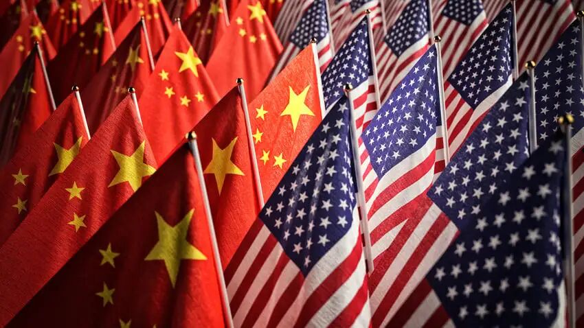 graphic image of China flags overlapping with US flags